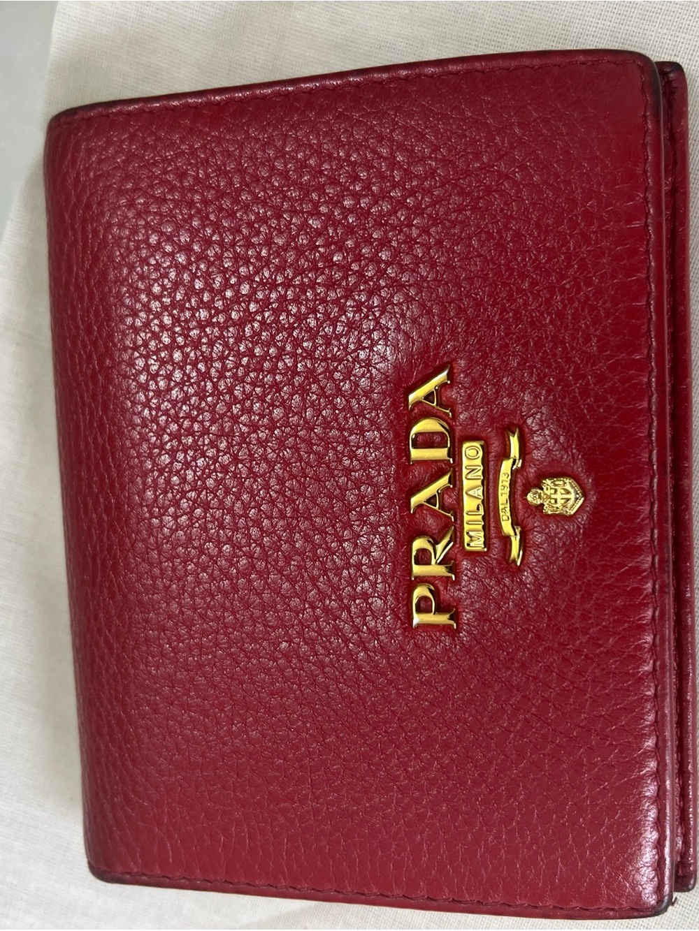 Prada Red Pebbled Leather Compact Wallet with Gold Logo